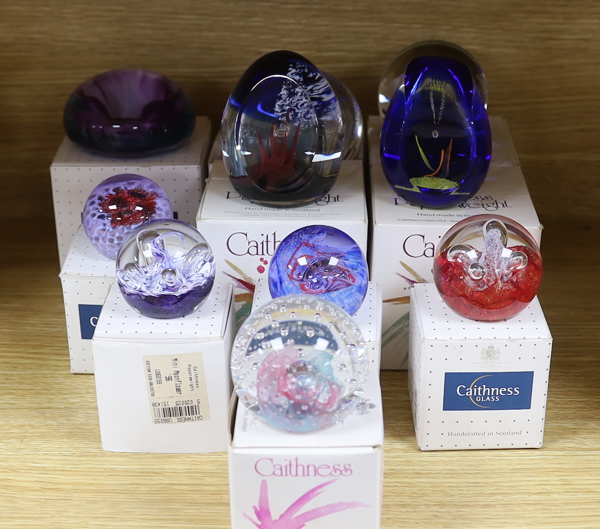 Ten Caithness paperweights, boxed, some limited edition